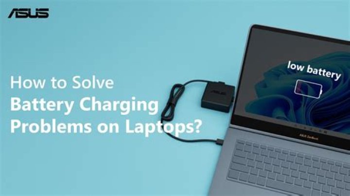 How do I charge my Toshiba laptop battery?