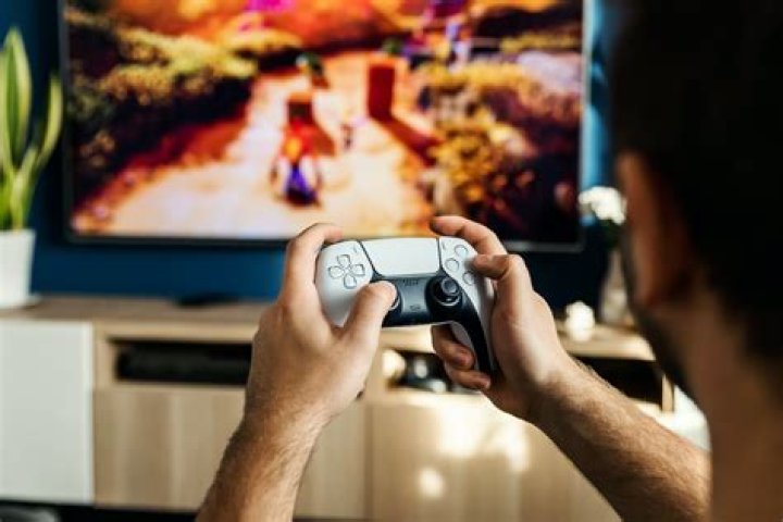 How do I play videogames on my TV?