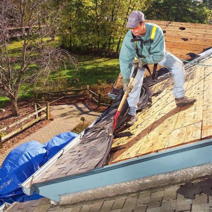How do you remove old shingles from a roof?